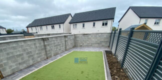 Patio with Silver Grey Flagstones, Artificial Lawn and Flower Beds in Swords, Dublin