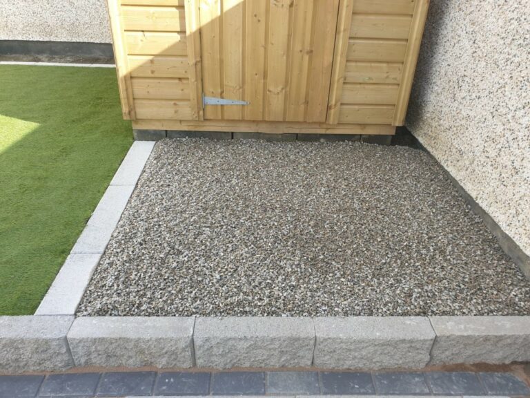 Tiered Granite Patio with Astroturf and Gravel Patch in Dublin